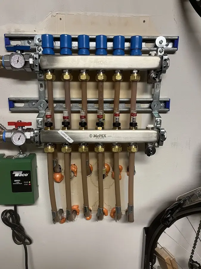 Plumber performing Water Heater Repair at a residential property in Pocatello